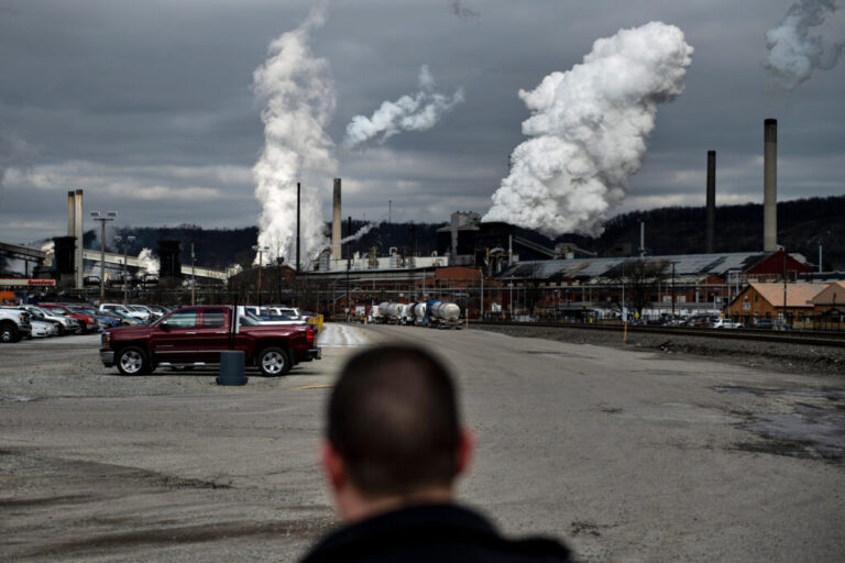 White plumes of smoke billow above U.S. Steel’s Clairton Coke Works in Clairton, Pa. Credit: Brendan Smialowski/AFP via Getty Images