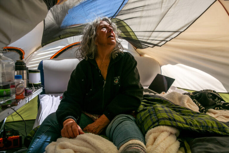 Diane Wilson sits in her tent, 14 days into her hunger strike, outside Dow’s Seadrift complex on March 16.