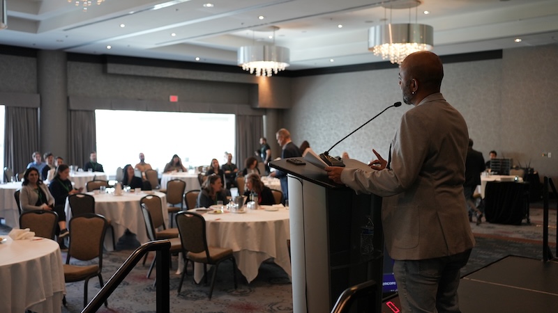 HRAI Canada Director of Government Relations Abhilash Kantamneni speaks at the 2026 Sustainable Workforce Summit in Vancouver/photo by Oliver Rondou