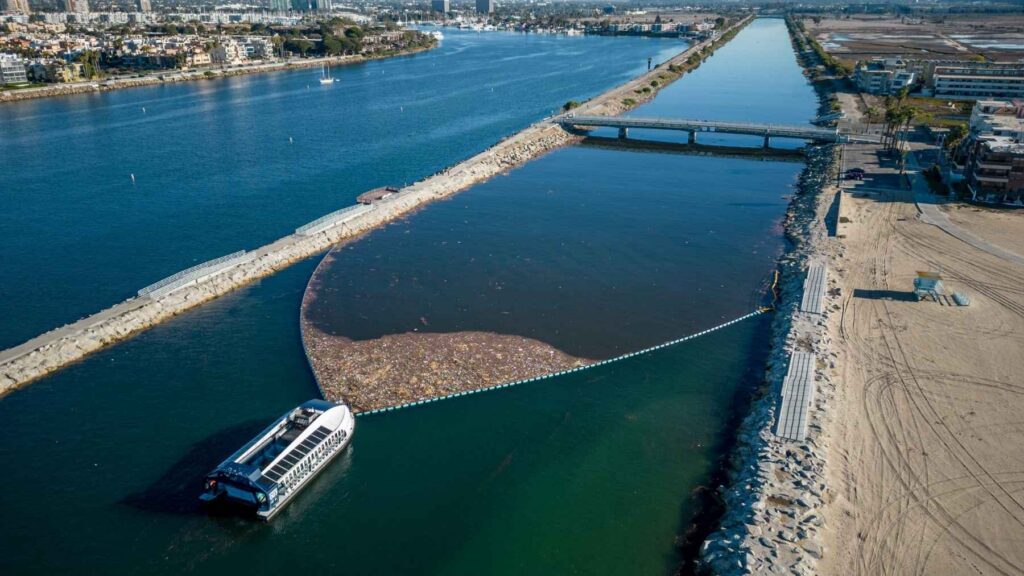 A solar-powered machine parked where an LA creek meets the sea pulled 143,710 pounds of trash out of the water last year before any of it could reach the Pacific, betting that catching plastic at the faucet beats chasing it across an ocean