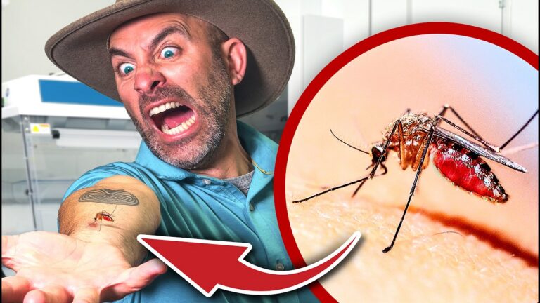 Excited man in a lab-like setting points to his forearm where a small insect bite is visible, with a magnified mosquito image in a red circle nearby.