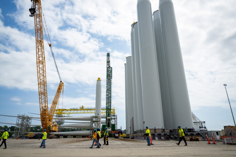 Workers gather at the State Pier in New London, Conn., on Aug. 25, 2025, to discuss the Trump administration’s order to halt construction of the offshore wind project called Revolution Wind. Credit: Tyler Russell/Connecticut Public via Getty Images