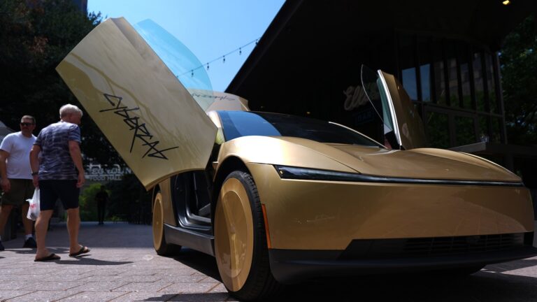 Musk launches steering-wheel-free taxi service