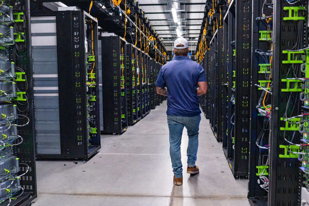 A Meta worker leads a tour of the company’s data center in Temple, Texas, on July 22. Credit: Mikala Compton/The Austin American-Statesman via Getty Images