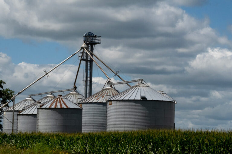 h3 Whats in Store for Summits Carbon Pipeline - Creation Covenant Alliance Grain bins sit at the edge of a cornfield near West Union, Iowa. Credit: Scott Olson/Getty Images