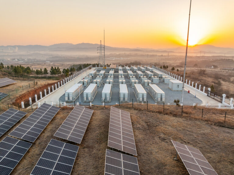 Clean Energy Sector Faces Challenges Amid Geopolitical and Economic Shifts - Creation Covenant Alliance Getty, Energy storage power station in the morning