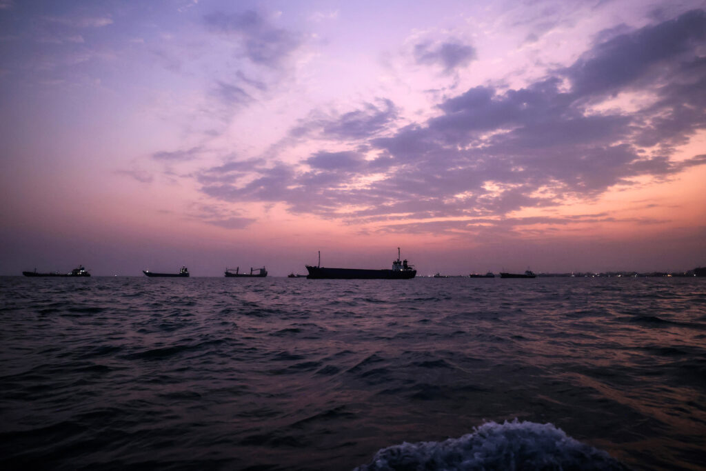Vessels navigate the Strait of Hormuz off the coast of Bandar Abbas, Iran, on Sept. 5. Credit: Atta Kenare/AFP via Getty Images